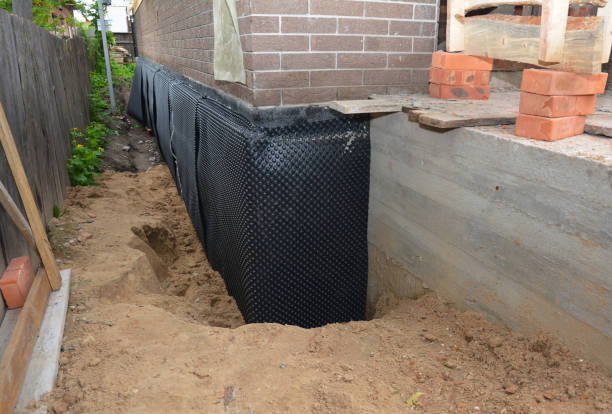 SJ Waterproofing Pros technician performing targeted Waterproofing assessment in Liberty Center, OH